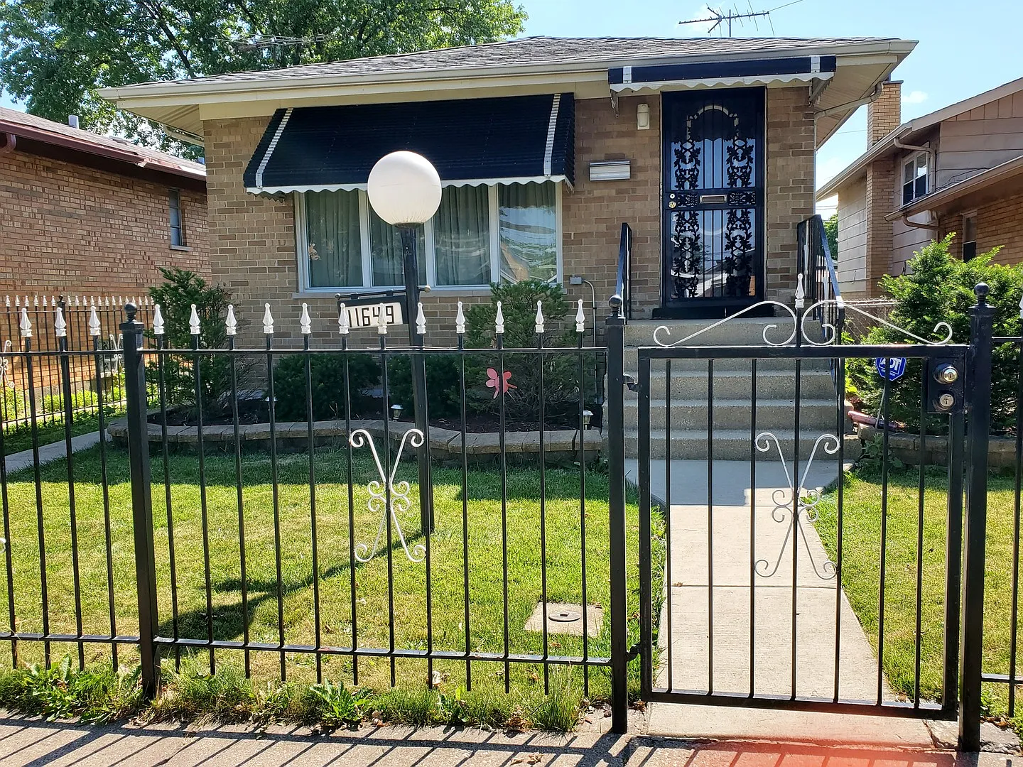 11649 S Justine St photo 1