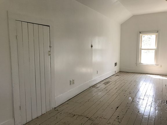 upstairs bed & attic door