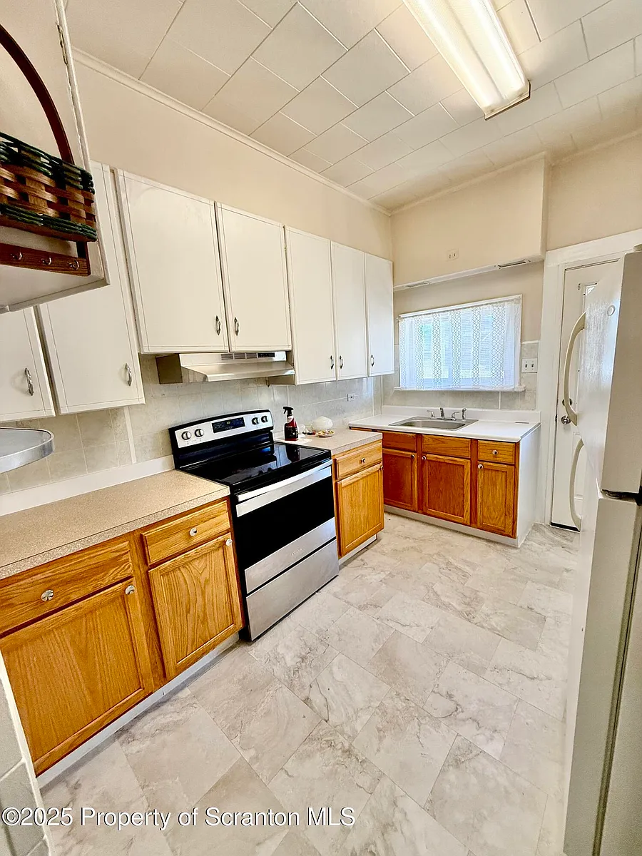 Building Photo - 1012 N Webster Ave #1