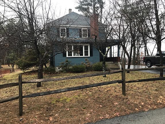 Large corner lot with double wide driveway