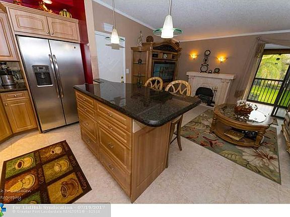 2nd image of 10877 W Clairmont Cir #211
