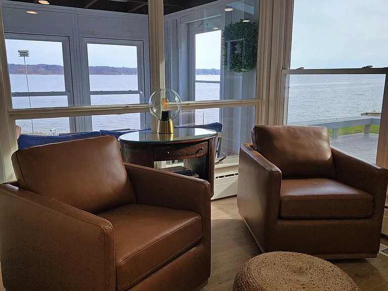 The lakeside living room chairs swivel making them a great place for morning coffee