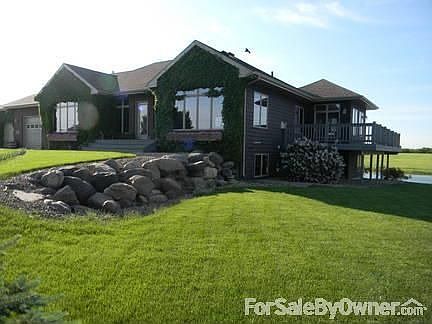 Side and front of house on channel side