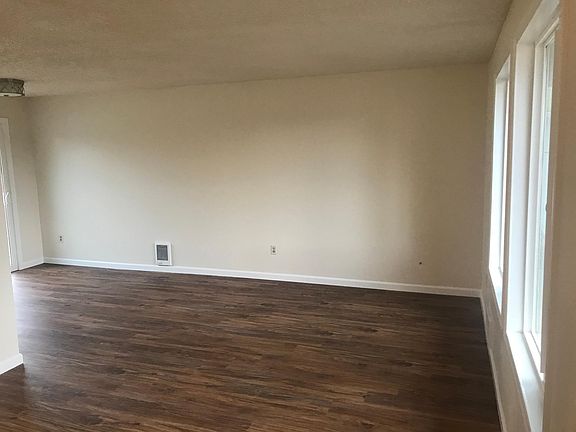 Living room/Dining area. High grade laminate flooring throughout the house.