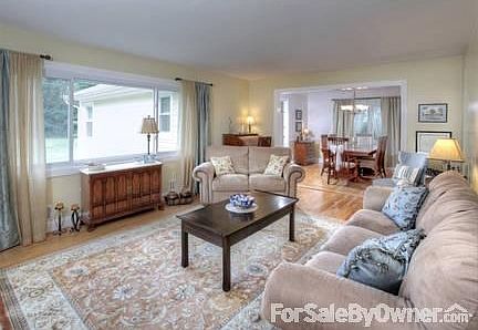 Living Room
						:
						Spacious, bright living room with huge picture window overlooking park like yard