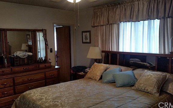 Master bedroom with ceiling fan