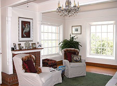 Living Room with fireplace and views