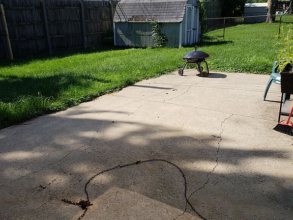 Back yard with patio and shed