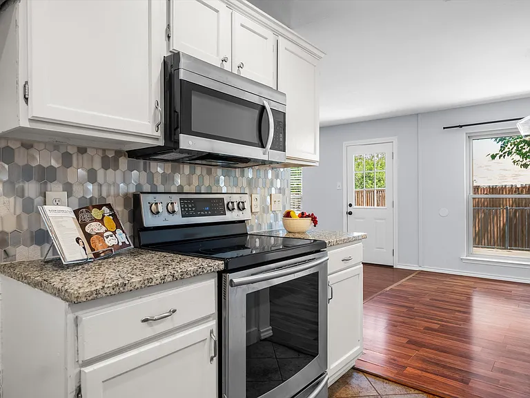 The kitchen floorplan is maximized for efficiency.