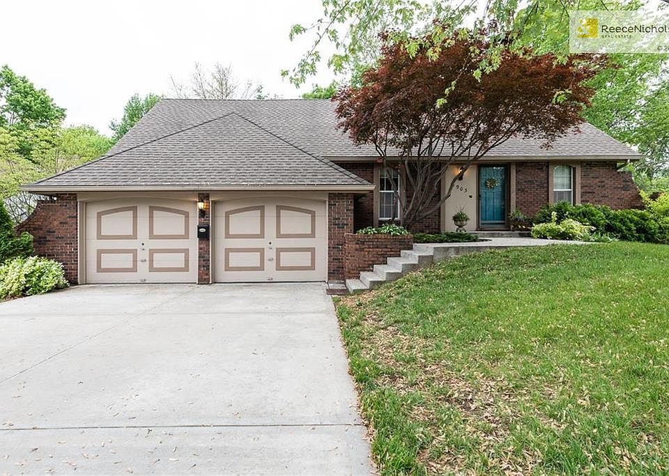 The front features brick trim, softer landscaping, newer roof and concrete, and a 2-car garage.