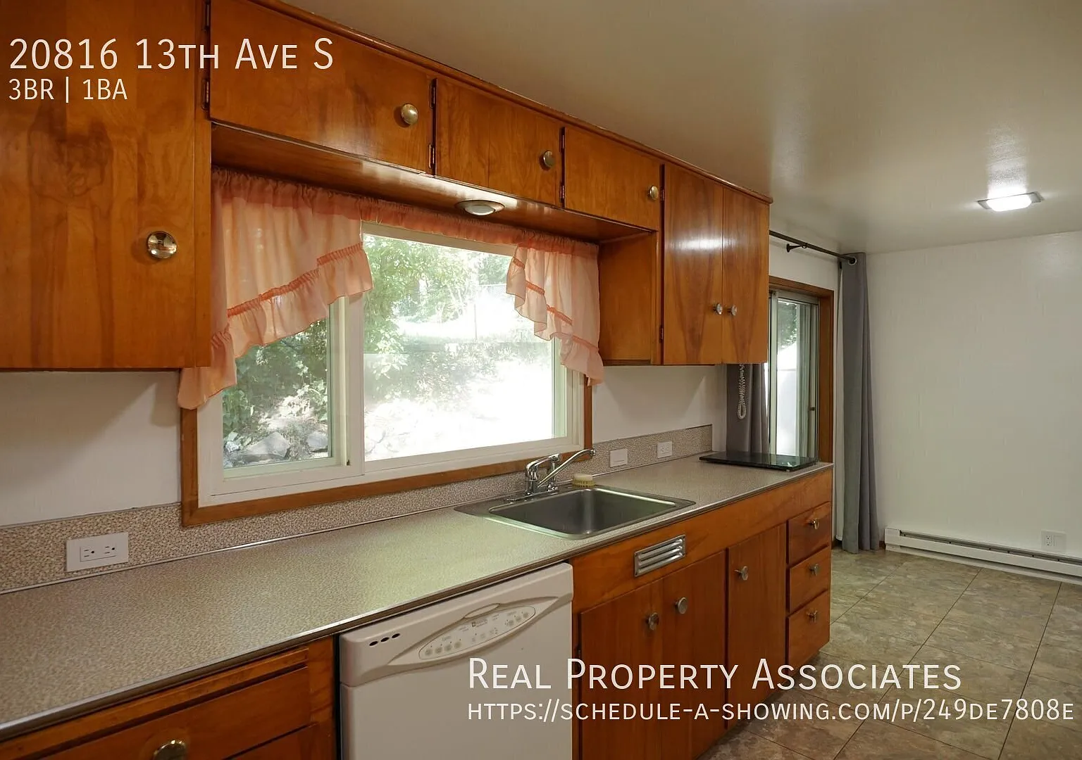 Large Three Bedroom Home with Two Fireplaces and a Carport — Photo 3