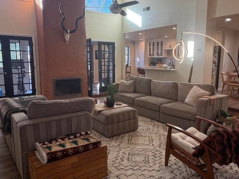 Sunken living room with vaulted ceilings