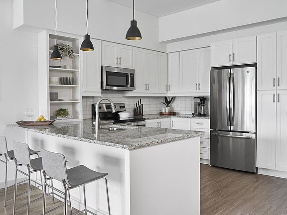 Designer-Furnished Studio Apartment Suite