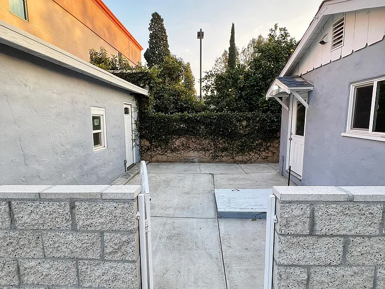 Front entrance to courtyard between garage and kitchen