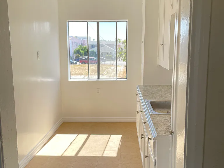 Kitchen to include stove and refrigerator