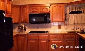 Update kitchen with oak cabinets and all new built-in appliance