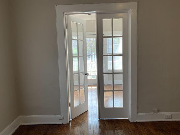 French double doors leading to bedroom.