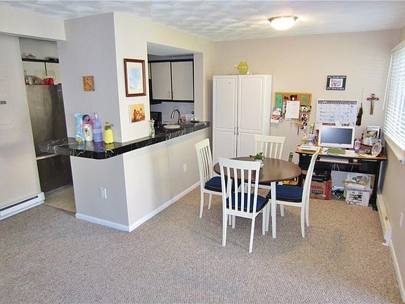 Spacious Open Floor Plan! This unit was renovated under 2 years ago. new paint, carpet and Kitchen Appliances!