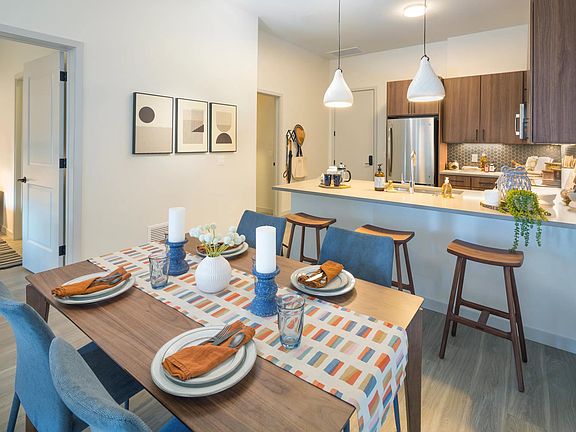 Quartz countertops with pull-up bar seating*