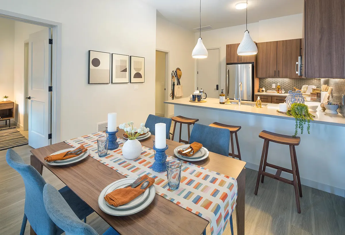 Quartz countertops with pull-up bar seating* - Modera West Wash Park