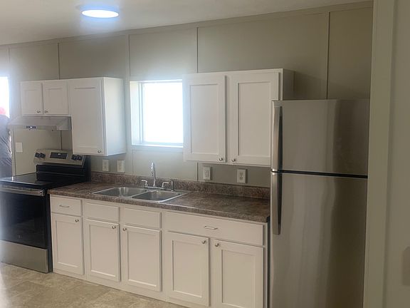 Kitchen with new stainless steel appliances