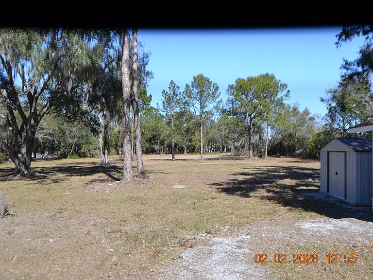 6204 W Knights Griffin Rd — Photo 2