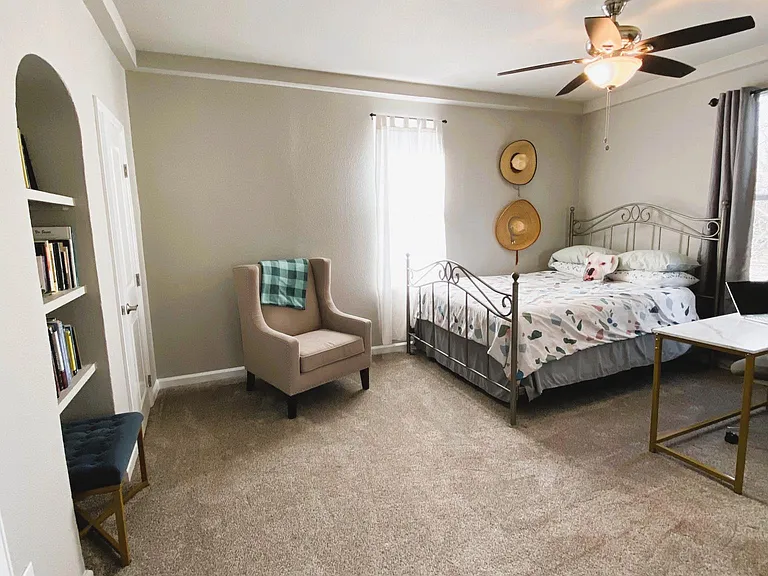 Oversized 3rd bedroom with 3 closets and built-in bookcase