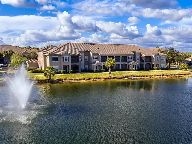 Wake up to the beauty of waterfront living with serene walking paths and a sparkling lake fountain.