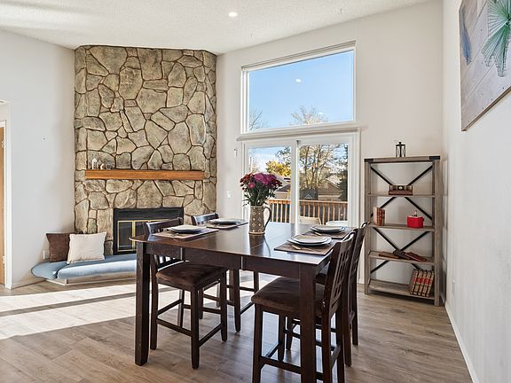 Upstairs area with wood burning fireplace. All new windows and sliding glass door.
