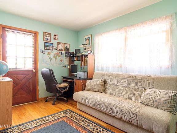 5th image of 4936 N Ozanam Ave