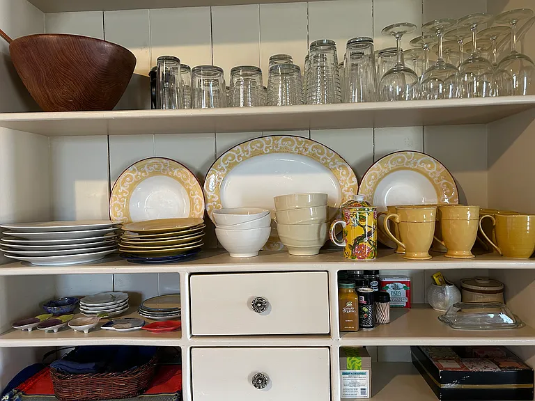 Kitchen hutch is fully stocked with dishware. Also included are small appliances, pots and pans, cooking utensils, silverware, place-mats, napkins, coffee maker and microwave oven. Casita starts out with all linens and starter paper goods.