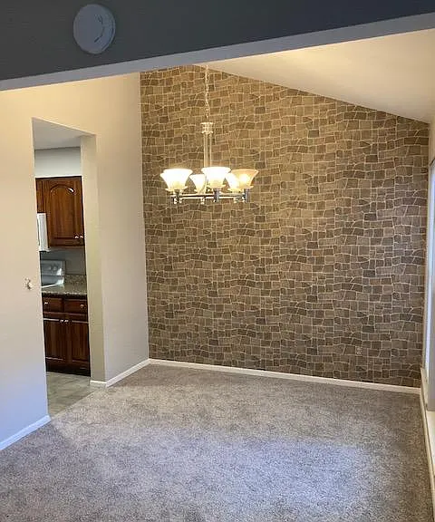 Dining room table area leading out of the kitchen