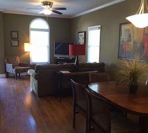 This end unit has high ceilings on both floors and lots of great light!