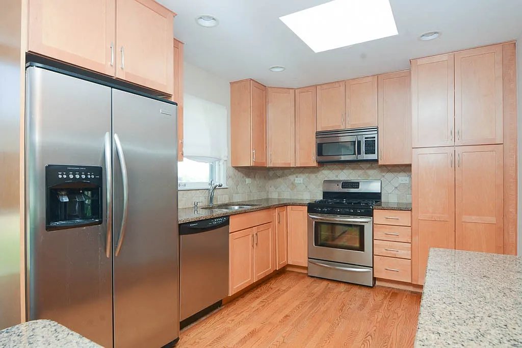 Appealing 3 Bed, 1.5 Bath at Central Ave + Reba St (Morton Grove) — Photo 2