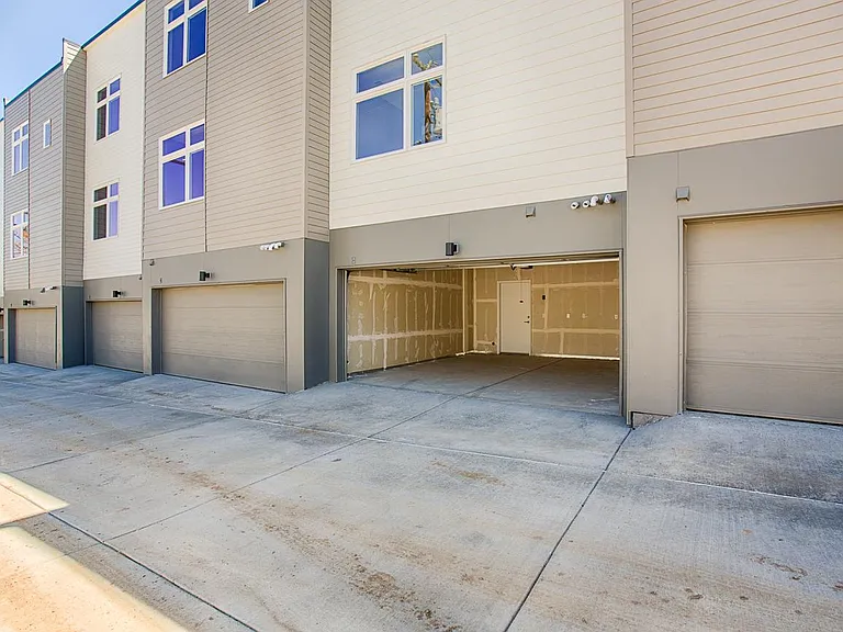 2 car attached garage with ally access