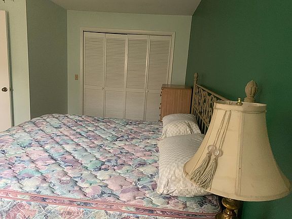 King size bed showing closet