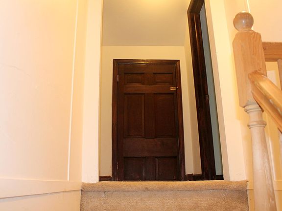 view to top of stairs, storage straight ahead