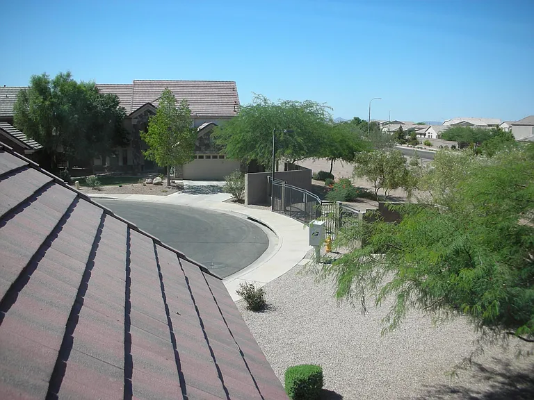 View from one of the front bedrooms. There is your mail box and the fire hydrant... convenient + safe.