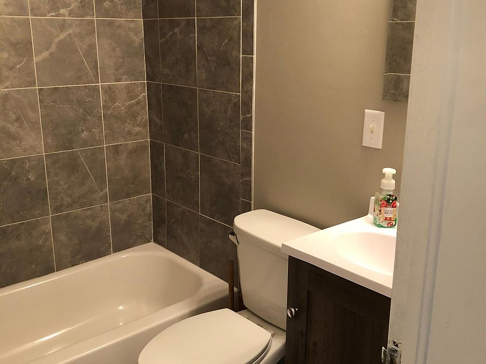 Bathroom all new tub and tiled surround.