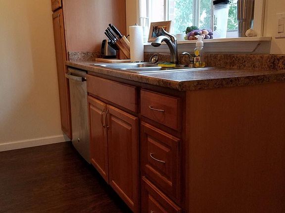 Kitchen overlooking wooded back yard