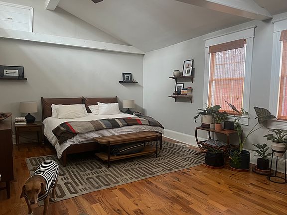 Primary bedroom, great lighting.

*Furniture not available