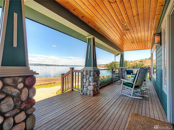 Sit back and relax and take in the sound, mountain, island, and maritime views from the front covered porch.