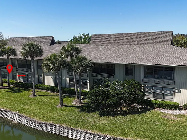 Beautiful lake & golf course views! LOCATION LOCATION! Just steps to clubhouse, heated pool, driving range & Pro Shop!
