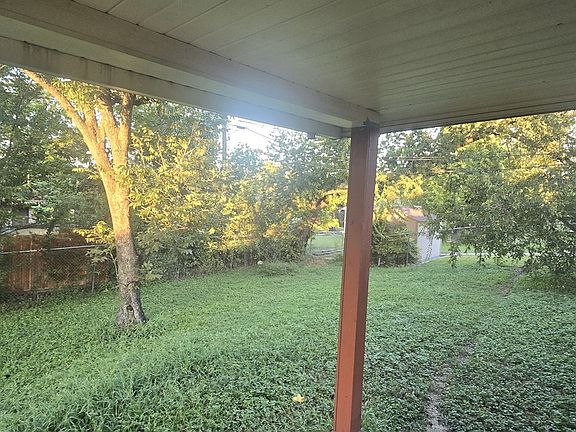 Back yard w covered deck