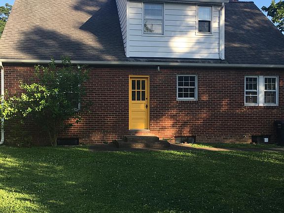 A fence runs along the back of the house 20 feet out from the house.