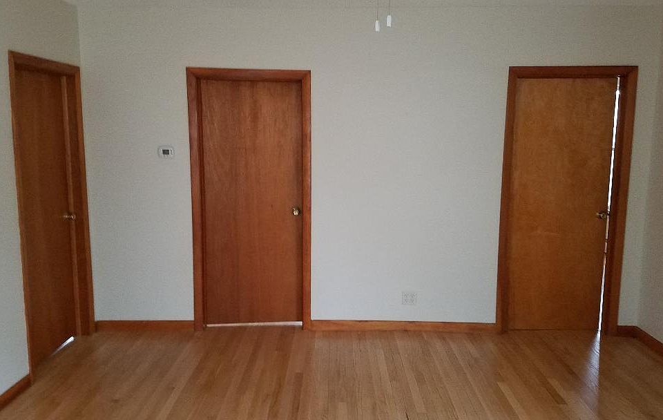 Central Living Room connecting to three bedrooms