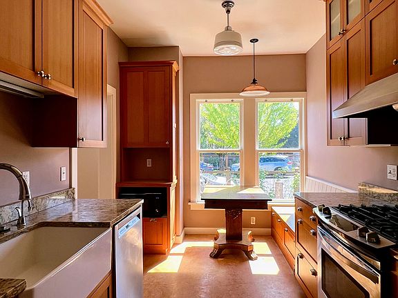 quality Bosch dishwasher, window faces garden
