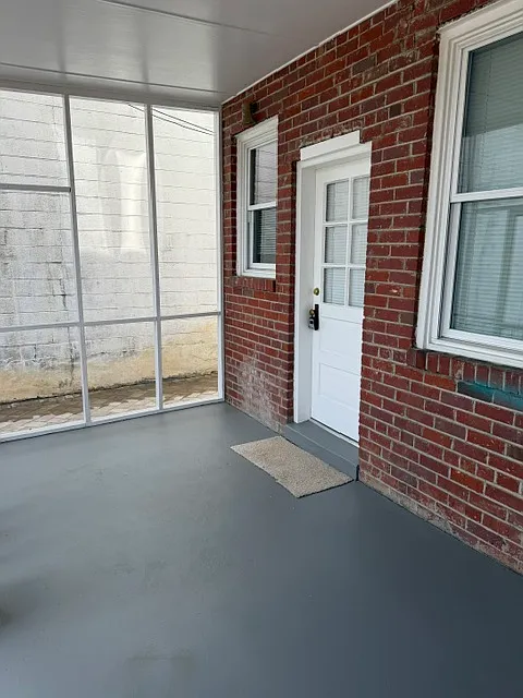 Back entrance, screened in porch