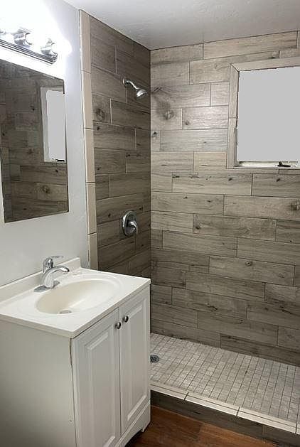 Tile shower and floor.