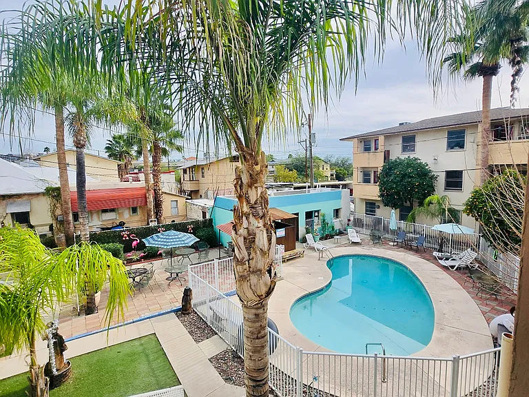 courtyard with pool and propane grill